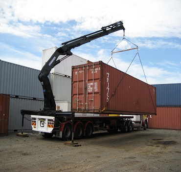 A container picked by a truck